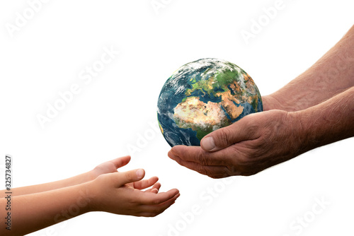 Fototapeta Naklejka Na Ścianę i Meble -  Close up of senior hands giving small planet earth to a child isolated on white background