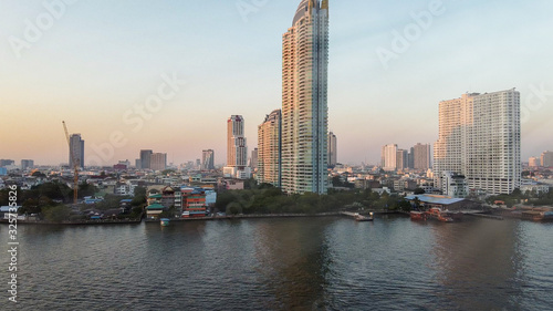 Bangkok, Thailand. Sunset aerial view of Asiatique Riverfront with cityscape and Chao Phraya River