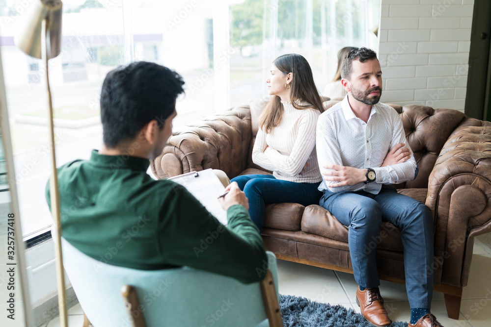 Fototapeta premium Psychologist Helping Couple With Relationship Difficulties