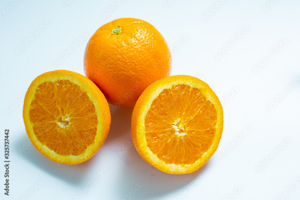 Fresh orange cut fruit on white background Fresh orange cut fruit on white background