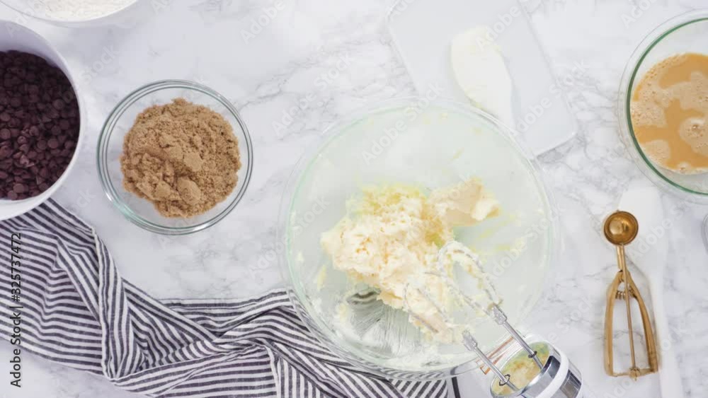 Step by step. Flat lay. Mixing ingredients in a glass bowl to make chocolate chip cookies. Step by step. Flat lay. Mixing ingredients in a glass bowl to make chocolate chip cookies.