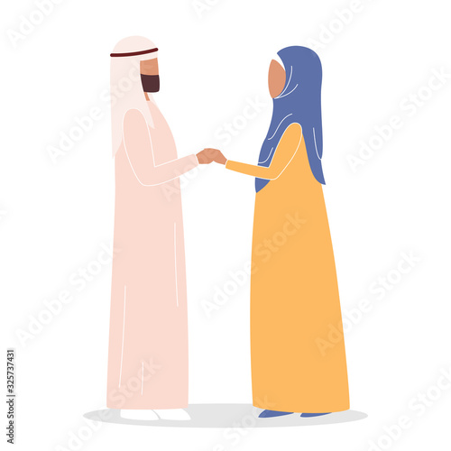 Modern muslim couple holding hands. Arabian woman and man