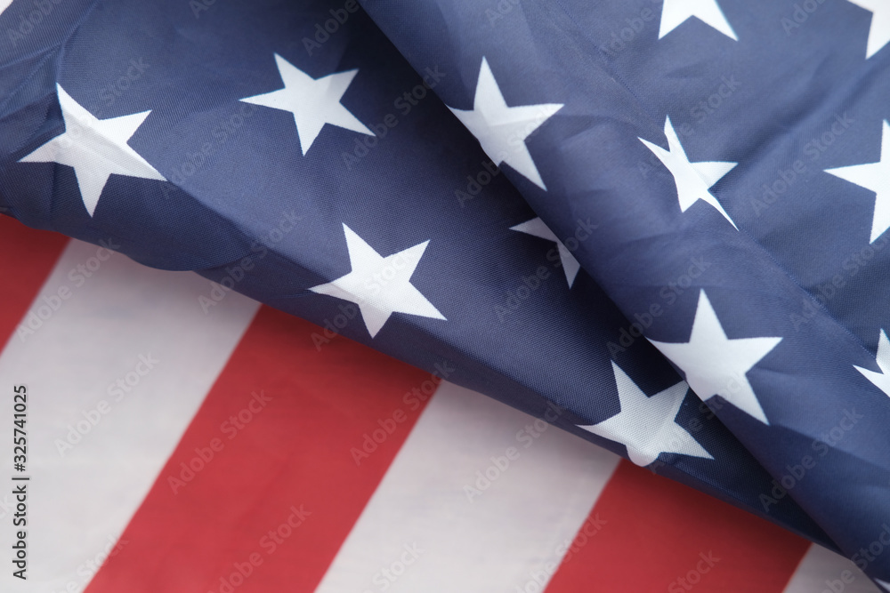 Fototapeta premium Close up of american flag on table 