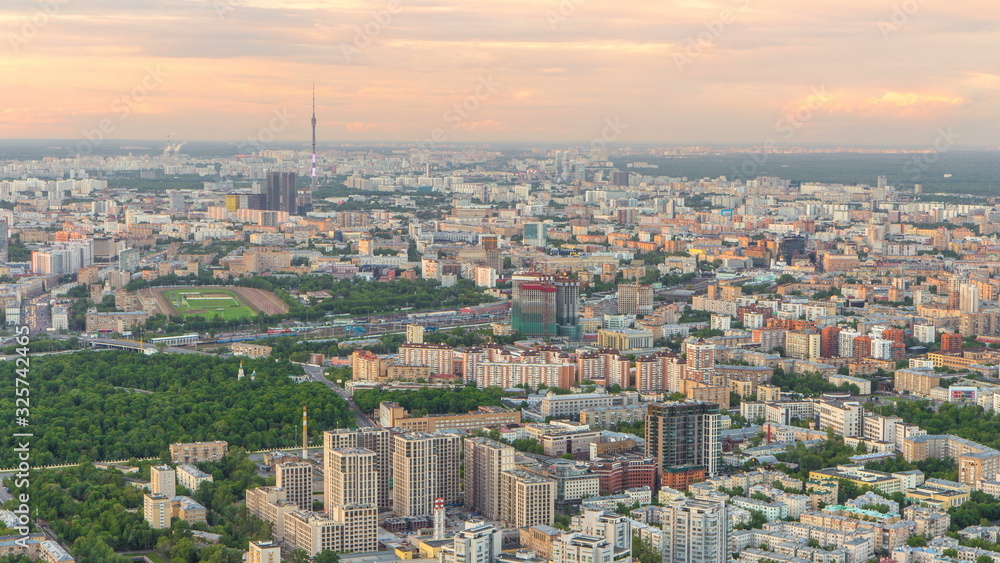 Aerial top view of Moscow city timelapse at sunset. Form from the observation platform of the business center of Moscow City.