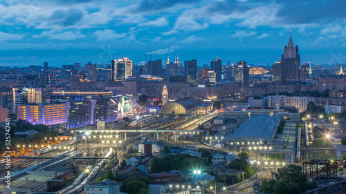 Panoramic view to Kiev Railway Station night to day timelapse and modern city in Moscow, Russia