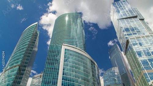 Skyscrapers of Moscow-city timelapse with reflections on glass surface. Business Offices, Corporate Buildings In Moscow, Russia