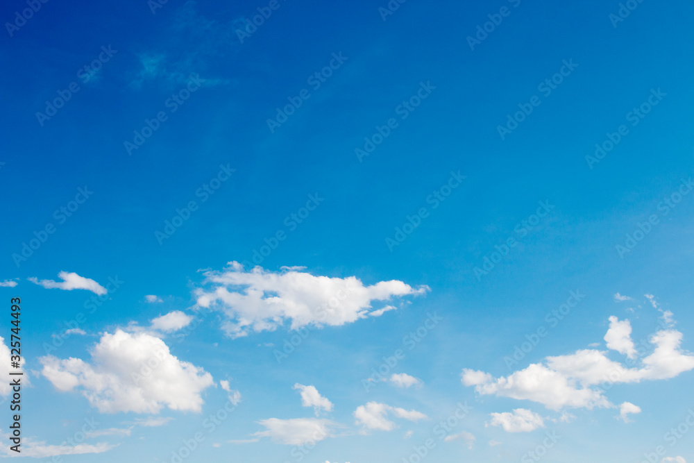 Bright blue sky with white clouds for background or wallpapers Bright blue sky with white clouds for background or wallpapers