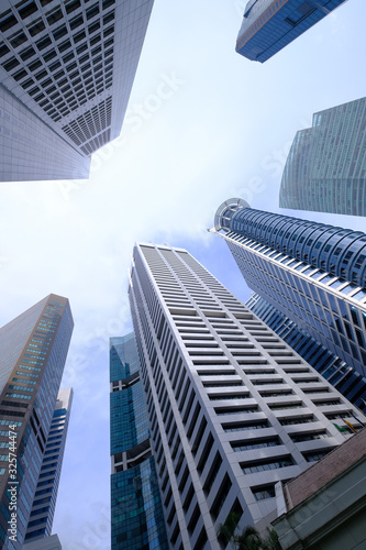  low angle view of singapore financial buildings.