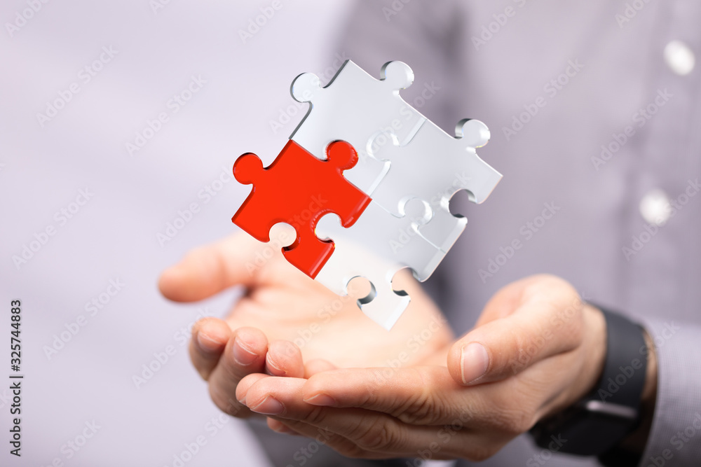 puzzle hand solution concept business. puzzle hand solution concept business.