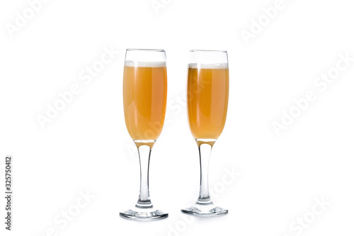 Bellini champagne cocktail in glass isolated on white background