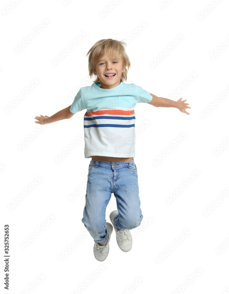 Happy little boy jumping on white background Happy little boy jumping on white background