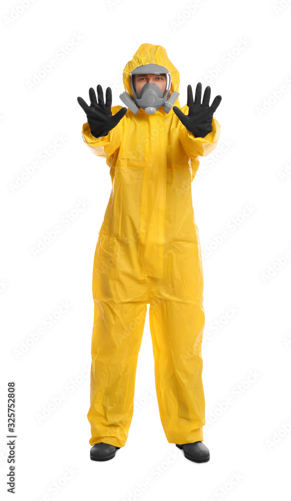 Man in chemical protective suit making stop gesture on white background. Virus research Man in chemical protective suit making stop gesture on white background. Virus research