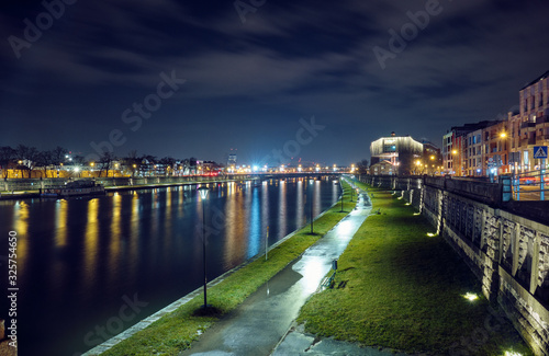 Vistula River in Krakow at night.