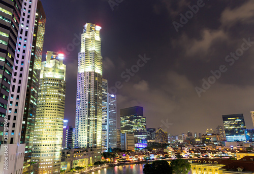 Singapore Downtown Core at night with reflection in the river