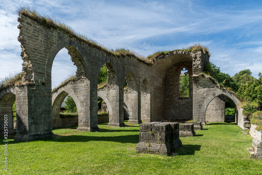 Remaining walls and arches of the medieval cloister in Alvastra