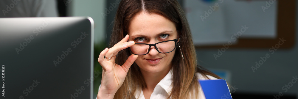 Office employee at workplace works with documents. Office employee at workplace works with documents.
