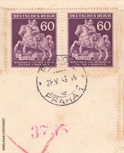 Riding postman (18th century). Postmark of the city Prague, stamp Bohemia and Moravia 1943