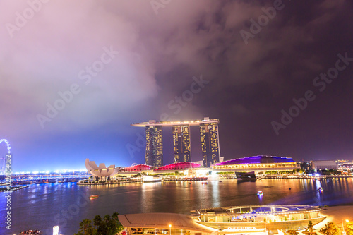 SINGAPORE - MARCH 23, 2016 : Marina Bay Sands Resort at night on MARCH 23, 2016 in Singapore. It is billed as the world's most expensive standalone casino property at S$8 billion