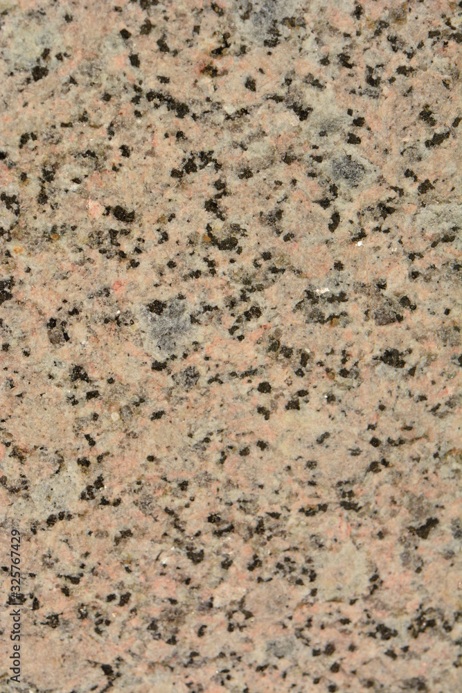 Texture of pink granite with black and white splashes Texture of pink granite with black and white splashes