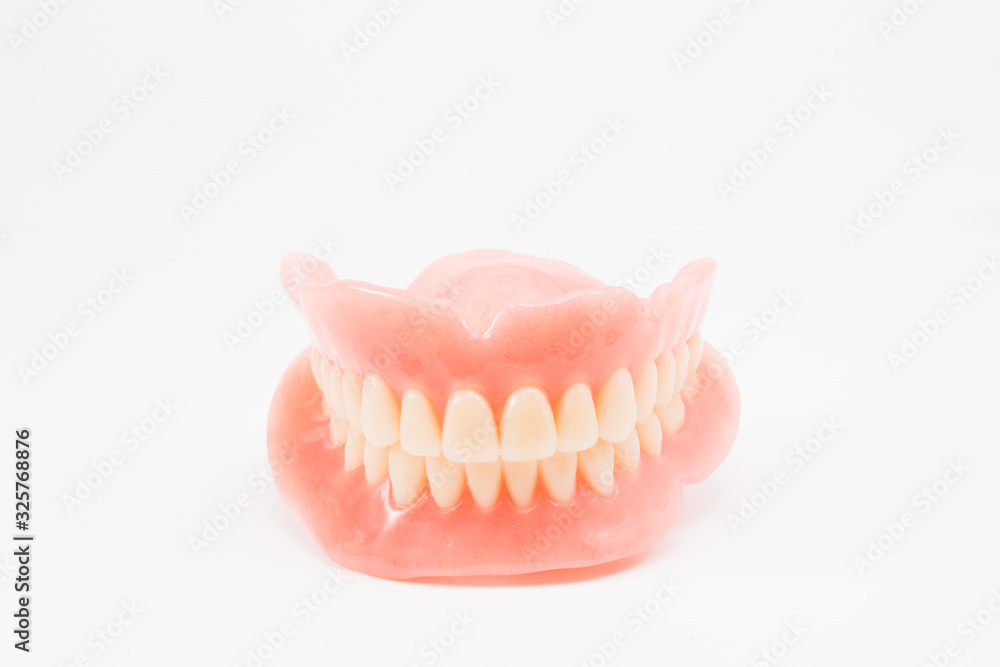 Obraz premium complte denture on white background