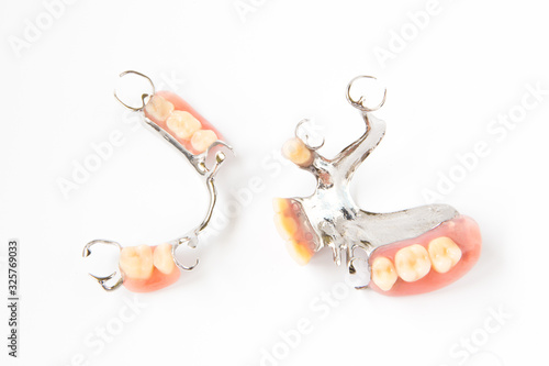 removable partial denture on white background. photo