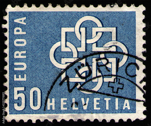 SWITZERLAND - CIRCA 1959: postage stamp 50 Swiss centimes printed by Swiss Confederation, shows Closed chain made of rings & squares, circa 1959 photo
