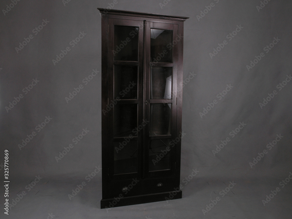 Classy and Modern Luxury Wooden Storage Cabinet for Home Interiors Furniture in Isolated Background Classy and Modern Luxury Wooden Storage Cabinet for Home Interiors Furniture in Isolated Background