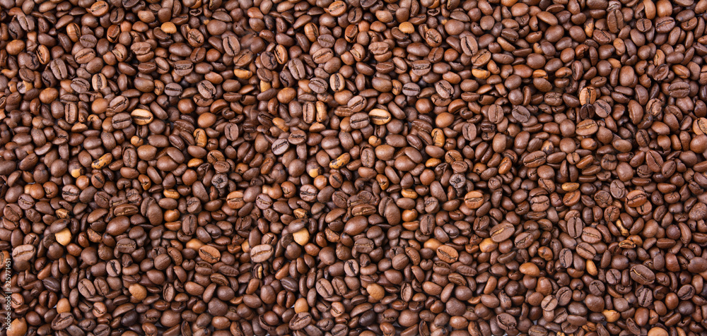 coffee beans close up on a white isolated background coffee beans close up on a white isolated background