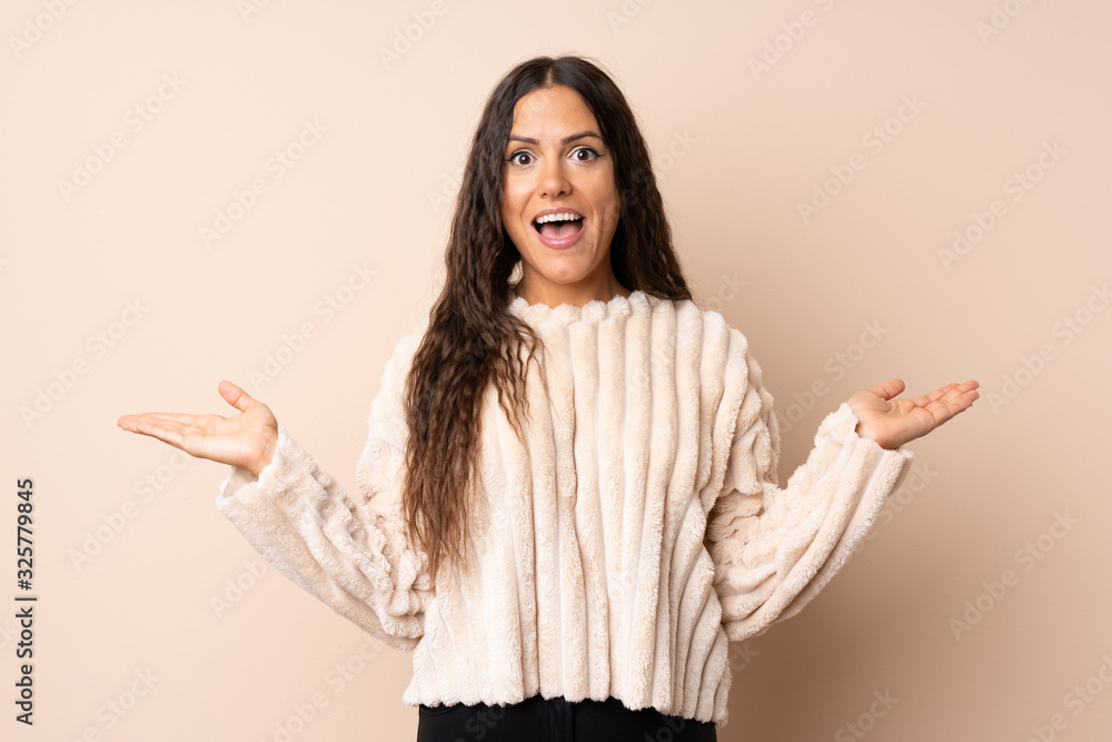 Young woman over isolated background with shocked facial expression Young woman over isolated background with shocked facial expression