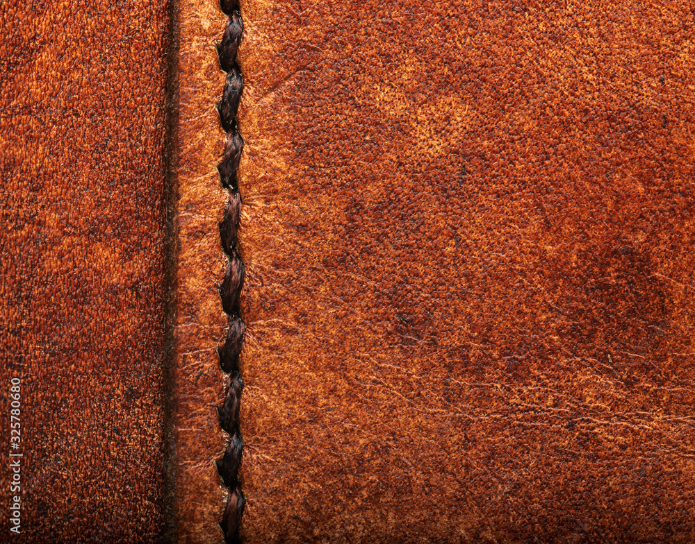 custom made wallpaper toronto digitalHand stitched leather showing dark brown waxed thread closeup full frame macro on vegetable tanned top grain
