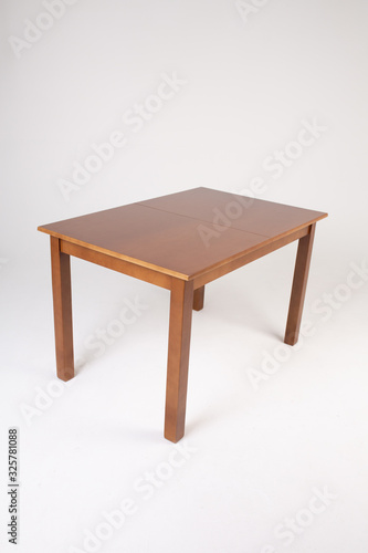 Single brown table with empty surface on an isolated white background
