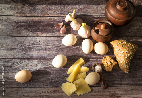 Easter still life in a rural style with eggs and vegetables