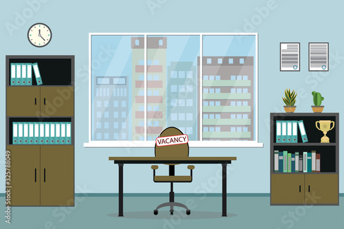Empty modern office with vacancy sign on chair,