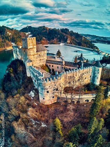 Beautiful panoramic aerial drone view to the Niedzica Castle also known as Dunajec Castle, located in the southernmost part of Poland in Niedzica, Nowy Targ County, Dunajec River, Lake Czorsztyn photo