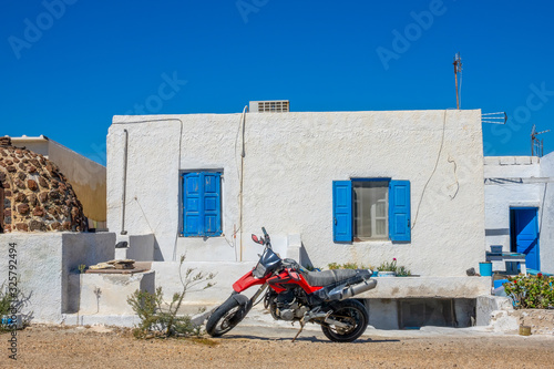 Motorcycle in Front of a House in Oia
