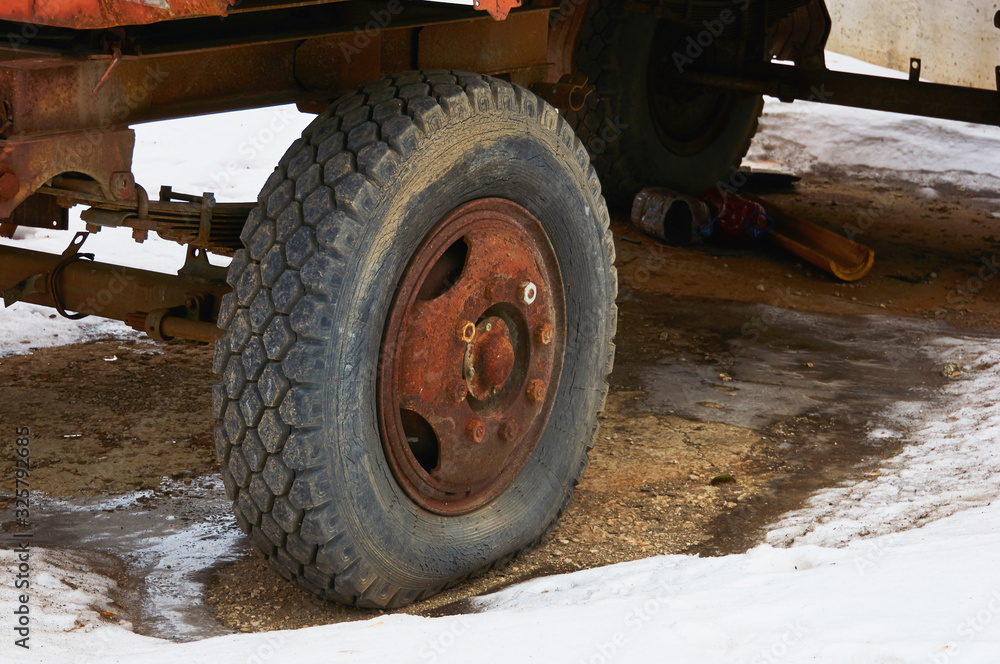 Old flat tire cracked from a big car. Old flat tire cracked from a big car.