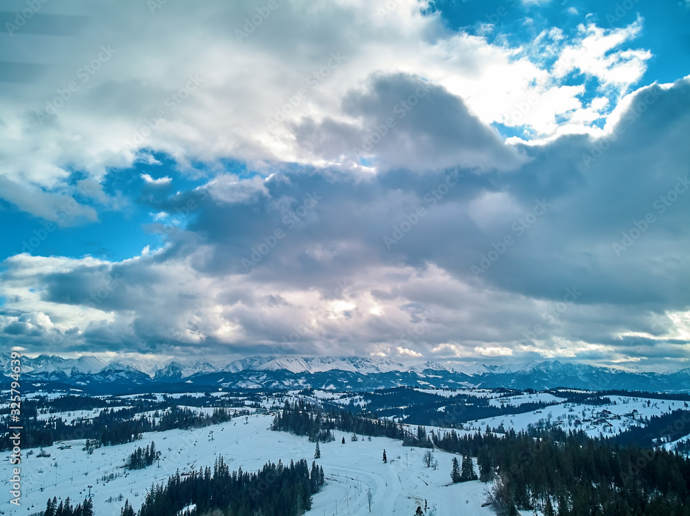 Beautiful panoramic aerial drone view to the Tatra Mountains (Tatras, Tatra) - mountain range between Slovakia and Poland - They are the highest mountain range in the Carpathian Mountains