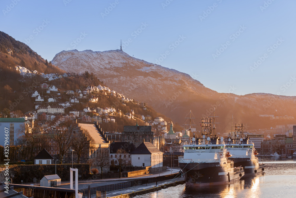 BERGEN, NORWAY - 2015  DECEMBER 26. AHTS Olympic Pegasus and Olympic Hercules inside Bergen Harbour.