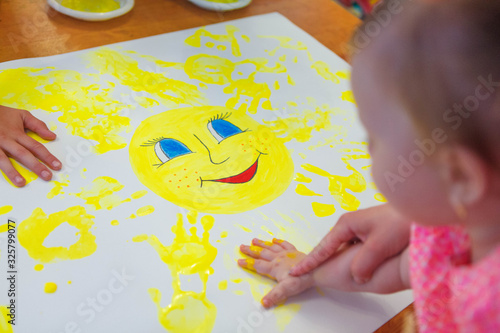 child painting with watercolors
