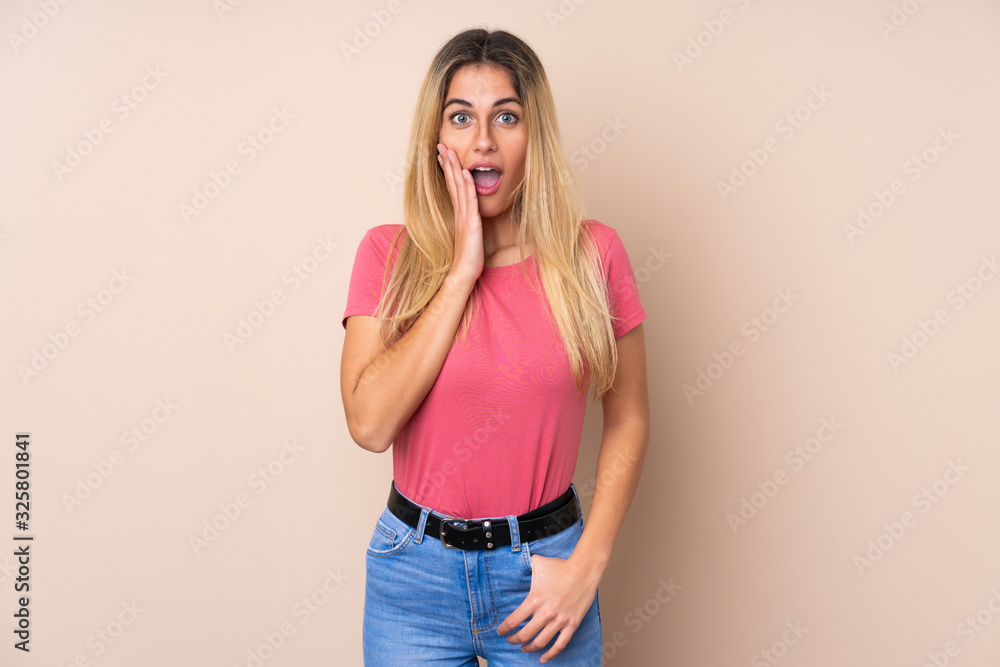 Young Uruguayan woman over isolated background with surprise and shocked facial expression Young Uruguayan woman over isolated background with surprise and shocked facial expression