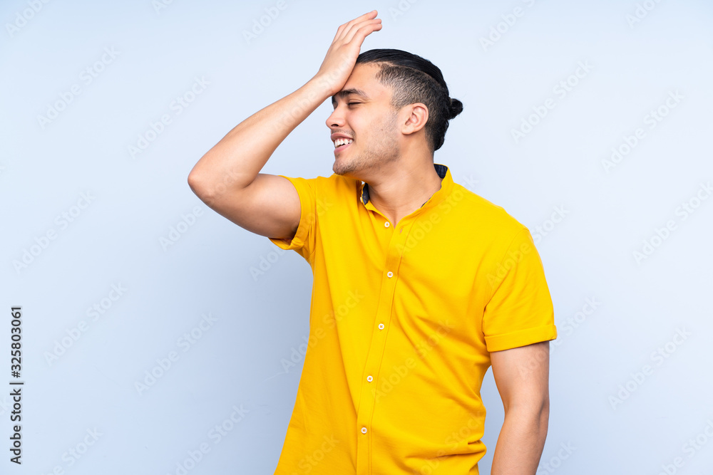 Asian handsome man over isolated background has realized something and intending the solution Asian handsome man over isolated background has realized something and intending the solution