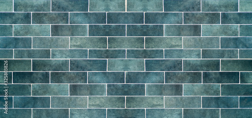 Blue ceramic tile background. Old vintage ceramic tiles in blue to decorate the kitchen or bathroom © uladzimirzuyeu