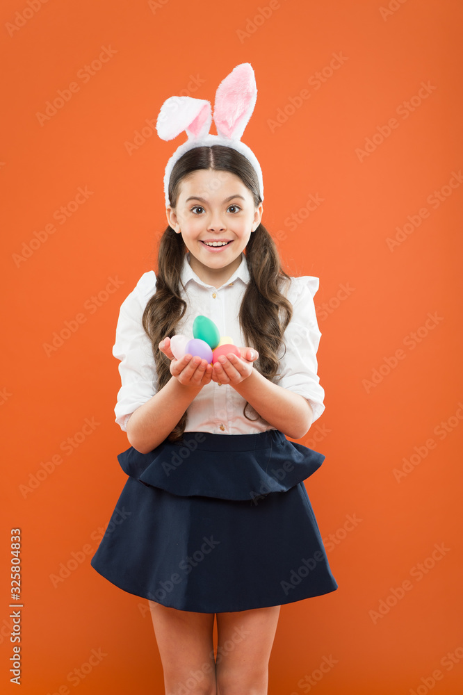 Spring holidays concept. Perfect Easter bunny. Fun and educational Easter holiday activities for kids of all ages. Adorable little girl with easter eggs. Cute bunny schoolgirl celebrate Easter day