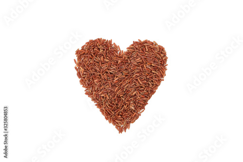 Heart made of rice isolated on white background