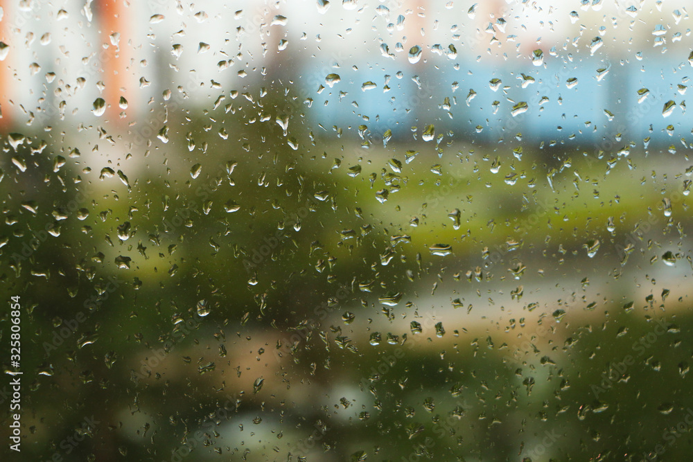 The view from the window in rainy weather on the streets of the city.