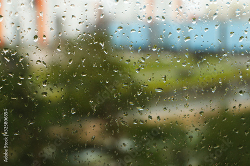 The view from the window in rainy weather on the streets of the city.