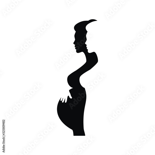 Silhouette of a young pregnant woman