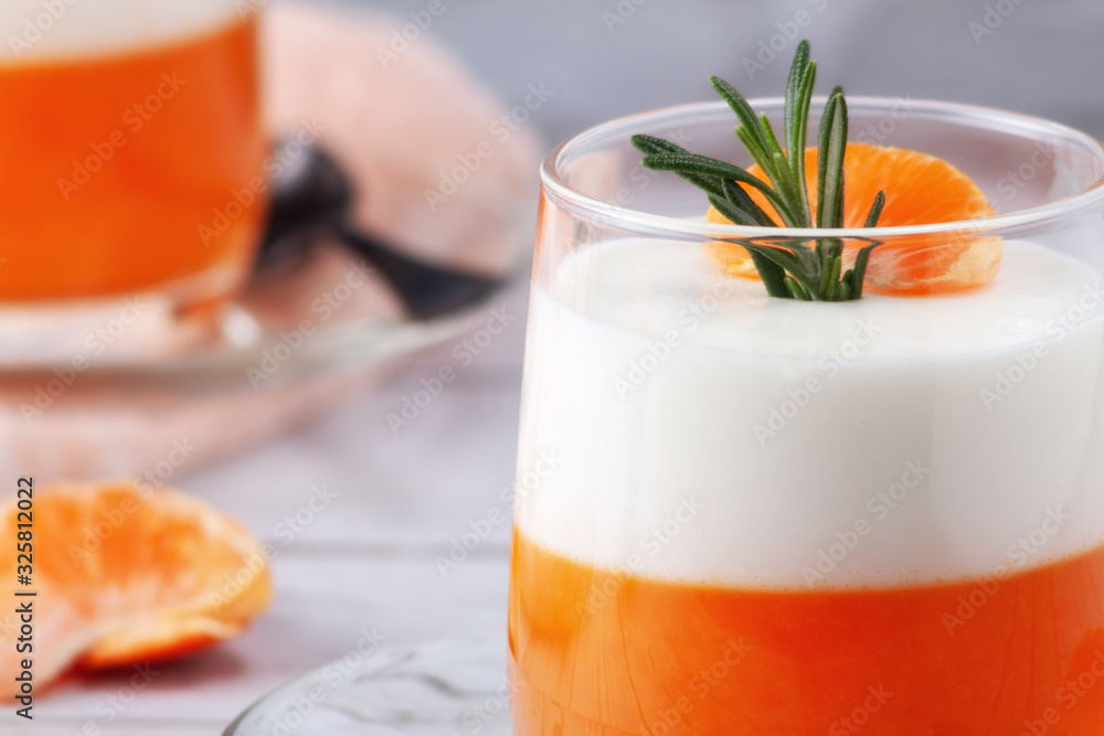 Panna Cotta with tangerines, jelly and rosemary, Italian dessert, home cooking. Copy space Panna Cotta with tangerines, jelly and rosemary, Italian dessert, home cooking. Copy space