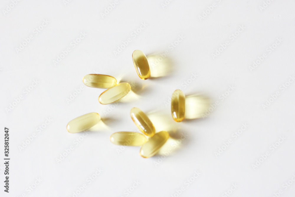Tablets and pills laying on table. Background for pharmacology. Medicament composition. Tablets and pills laying on table. Background for pharmacology. Medicament composition.