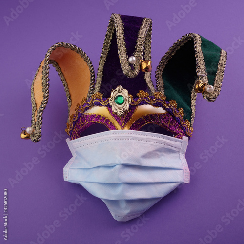 Corona virus and Venice carnival. Epidemic virus. Carnival mask with protective mask